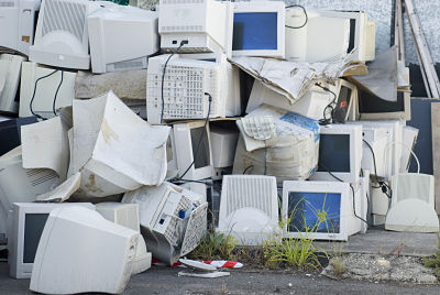 pile of junk monitors to be disposed of